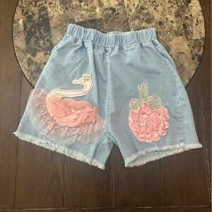 Stylish Embellished Denim Shorts with Pink Accents